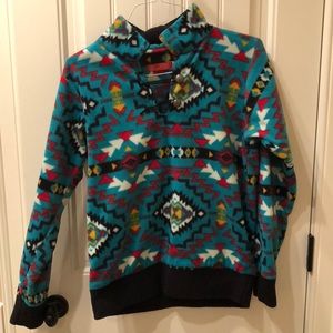 The Punchy Peyote pullover, size medium, colorful Aztec print.